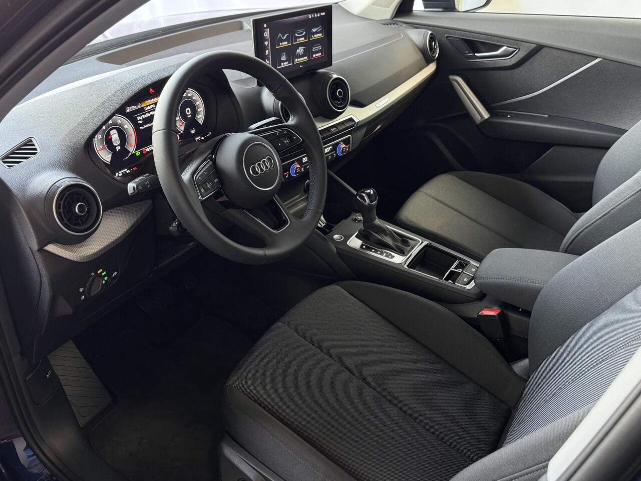 Audi Q2 35 TFSI 1.5 S EDITION NAVARRA BLAUW ELEK.KLEP 150PK VIR.COCKPIT 18''LMV TOUCHSCREEN CARPLAY NAVI CAMERA LED STOELVERW. PDC 03/2025 "Audi rijden begint bij Topautos.nl - 20 Audi topmodellen direct op voorraad!"