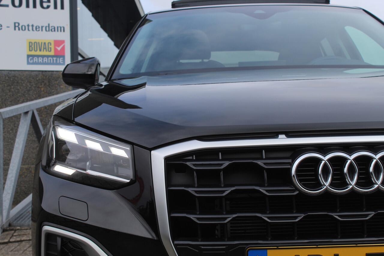 Audi Q2 35 TFSI S-line Automaat/Panoramadak/Navigatie/Virtual cockpit/Achteruitrijcamera/Parkeersensoren rondom/Apple carplay/Stoelverwarming/Climate control/Elektrische achterklep/Cruise control/Draadloze telefoonlader/DAB/18'' Lichtmetalen velgen.