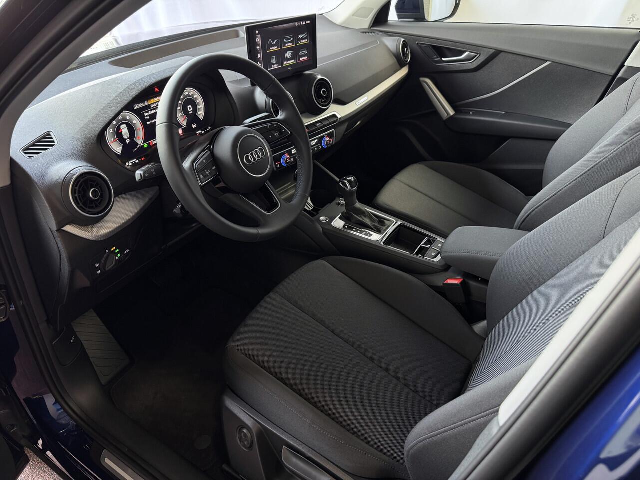 Audi Q2 35 TFSI 1.5 S EDITION NAVARRA BLAUW ELEK.KLEP 150PK VIR.COCKPIT 18''LMV TOUCHSCREEN CARPLAY NAVI CAMERA LED STOELVERW. PDC 03/2025 "Audi rijden begint bij Topautos.nl - 20 Audi topmodellen direct op voorraad!"