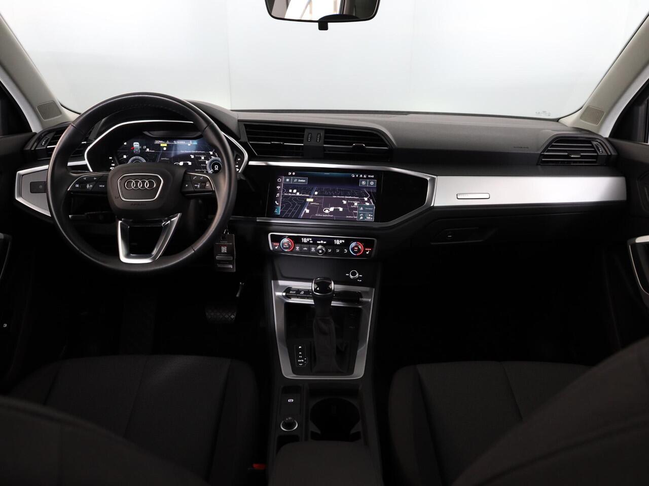 Audi Q3 45 TFSI e Business Edition 245 pk | SOH 94% | S-tronic | Navigatie | Parkeersensoren | Achteruitrijcamera | LED koplampen | Stoelverwarming |