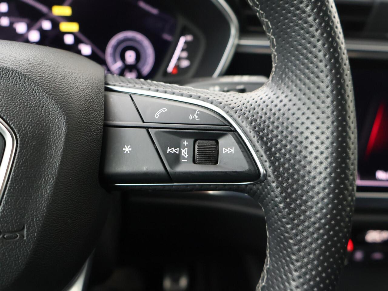 Audi Q3 Sportback 45 TFSI e S Edition | 245 PK | SoH 91% | Adaptive cruise control | Navigatiesysteem | Voorstoelen verwarmd | S line | 20" LM velgen |