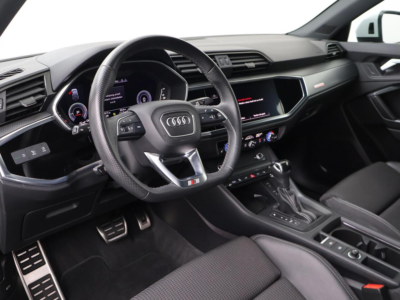 Audi Q3 Sportback 45 TFSI e S Edition | 245 PK | SoH 91% | Adaptive cruise control | Navigatiesysteem | Voorstoelen verwarmd | S line | 20" LM velgen |