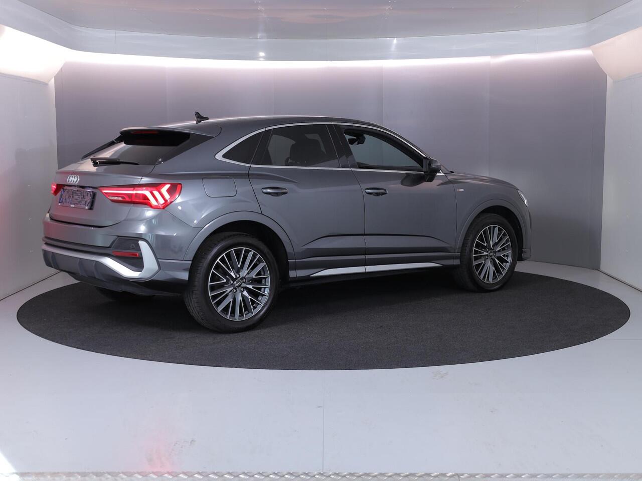 Audi Q3 Sportback 45 TFSI e S Edition 245pk | 87% SOH | Private lease vanaf ¤759,- | Elektrisch verstelbare voorstoelen | Parkeeercamera | Verwarmbare voorstoelen | Navigatie