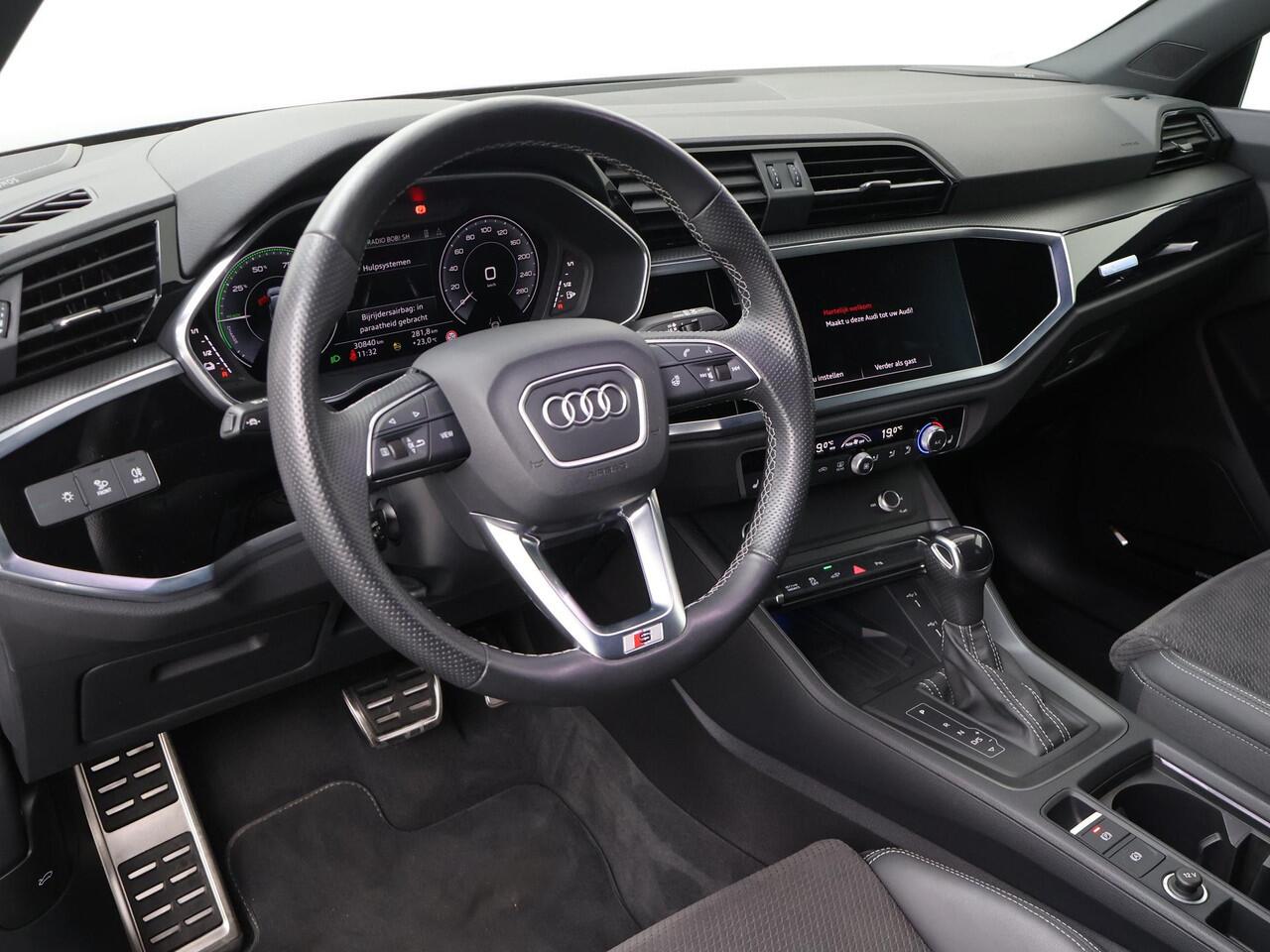 Audi Q3 Sportback 45 TFSI e S Edition | 245 PK | SoH 89% | Trekhaak | Panoramadak | 360 graden camera's | LM 20" velgen | Sportstoelen |