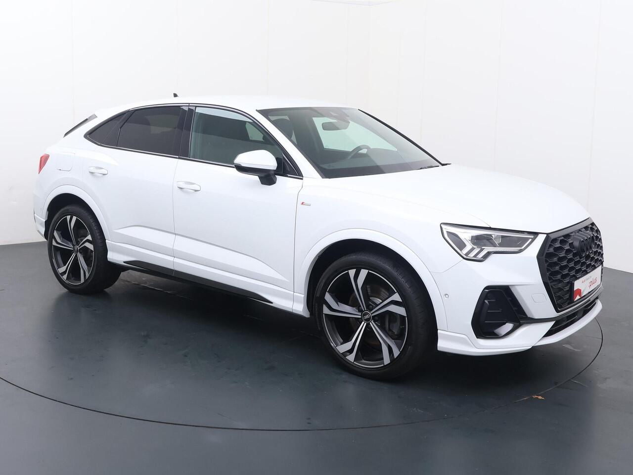 Audi Q3 Sportback 45 TFSI e S Edition | 245 PK | SoH 91% | Adaptive cruise control | Navigatiesysteem | Voorstoelen verwarmd | S line | 20" LM velgen |