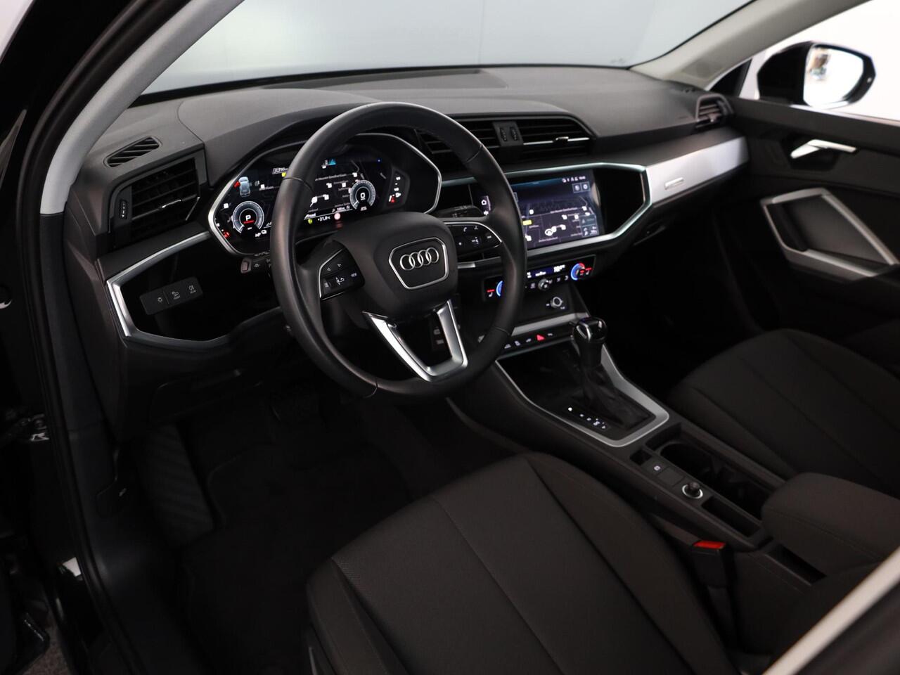 Audi Q3 45 TFSI e Business Edition 245 pk | SOH 94% | S-tronic | Navigatie | Parkeersensoren | Achteruitrijcamera | LED koplampen | Stoelverwarming |