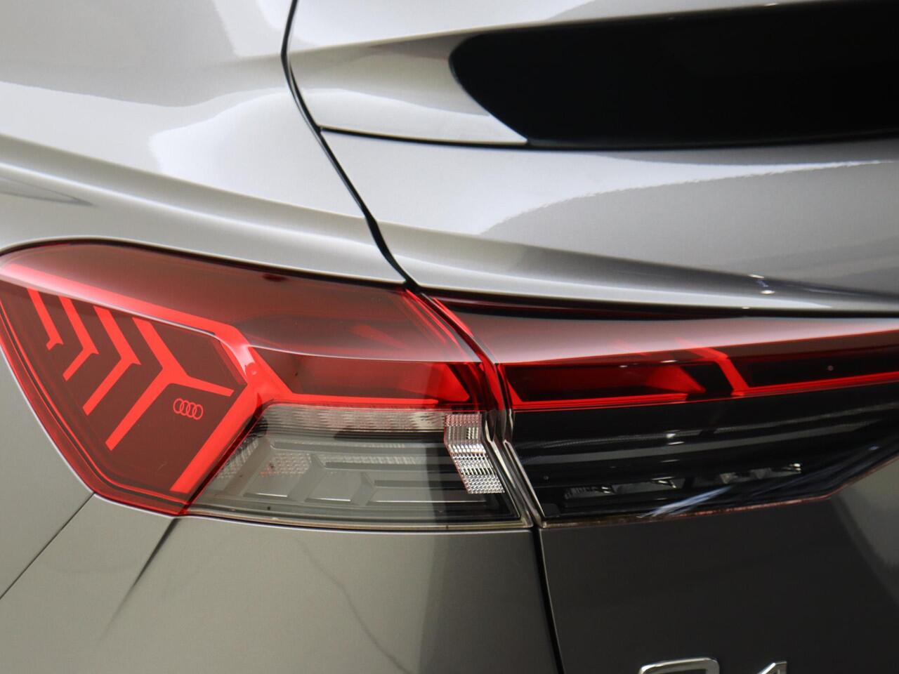 Audi Q4 Sportback e-tron 40 Advanced edition 77 kWh | Parkeersensoren | Lederen bekleding | SoH 92%| Cruise control | CarPlay | Navigatie Plus | Stoelverwarming | Voorklimatisering |