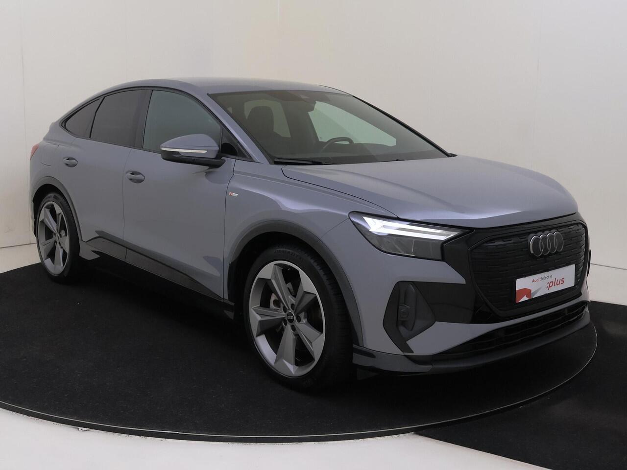 Audi Q4 Sportback e-tron 40 S edition 77 kWh | Head-up display | Keyless | LED matrix verlichting | Adaptieve cruise control | Achteruitrijcamera | Navigatie Plus | Leder/alcantara bekleding |