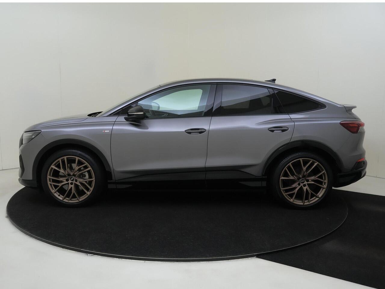 Audi Q4 Sportback e-tron 40 S edition 77 kWh | Panoramadak | Head-up display | SONOS audio | Keyless | Stoelverwarming | Lederen bekleding | Dodehoek detectie | Achteruitrijcamera | Adaptieve cruise control |