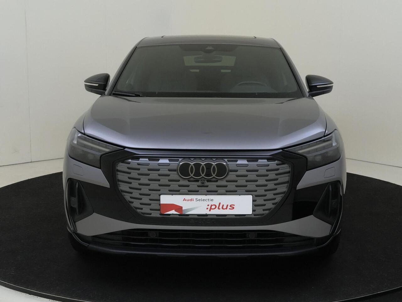 Audi Q4 Sportback e-tron 40 S edition 77 kWh | Panoramadak | Head-up display | SONOS audio | Keyless | Stoelverwarming | Lederen bekleding | Dodehoek detectie | Achteruitrijcamera | Adaptieve cruise control |