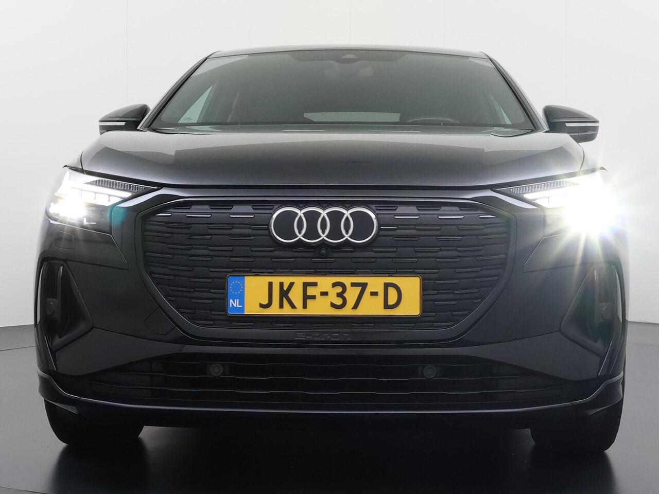 Audi Q4 Sportback e-tron 50 quattro 77 kWh S LINE VAN: ¤45.900,- VOOR: ¤40.877,- UW EINDEJAARSVOORDEEL: ¤5.023,- | in- exterieur | WARMTEPOMP| HEAD UP DISPLAY | ELECTR. STOELEN+GEHEUGEN | PANORAMADAK RIJKLAARPRIJS INCL. 12MND BOVAG | DEALER ONDERHOUDEN