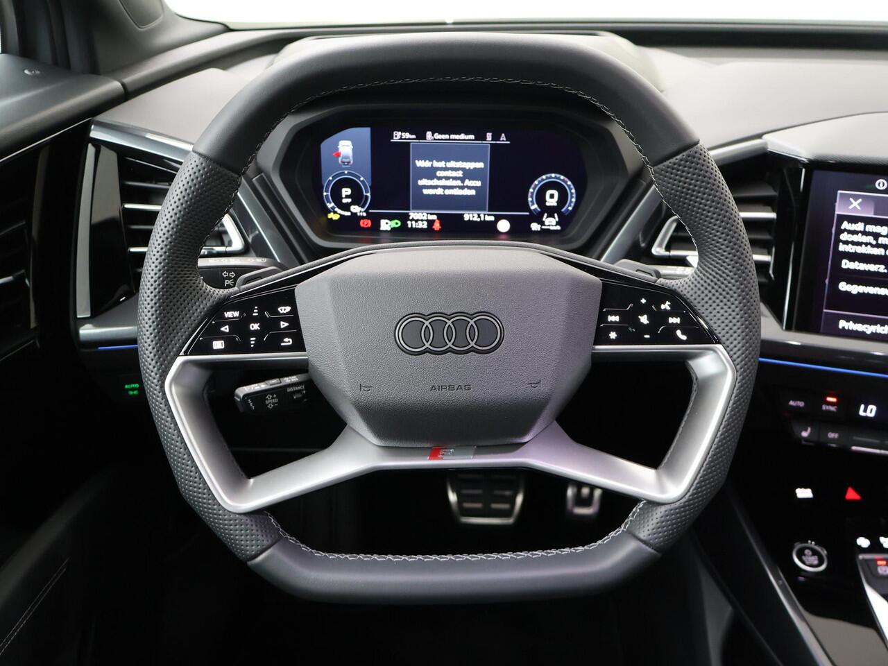 Audi Q4 e-tron 45 quattro S Edition 82 kWh | 286 PK | SoH 99% | Trekhaak | Elek. achterklep | Matrix LED koplampen | 21" LM velgen | Head-up Display |