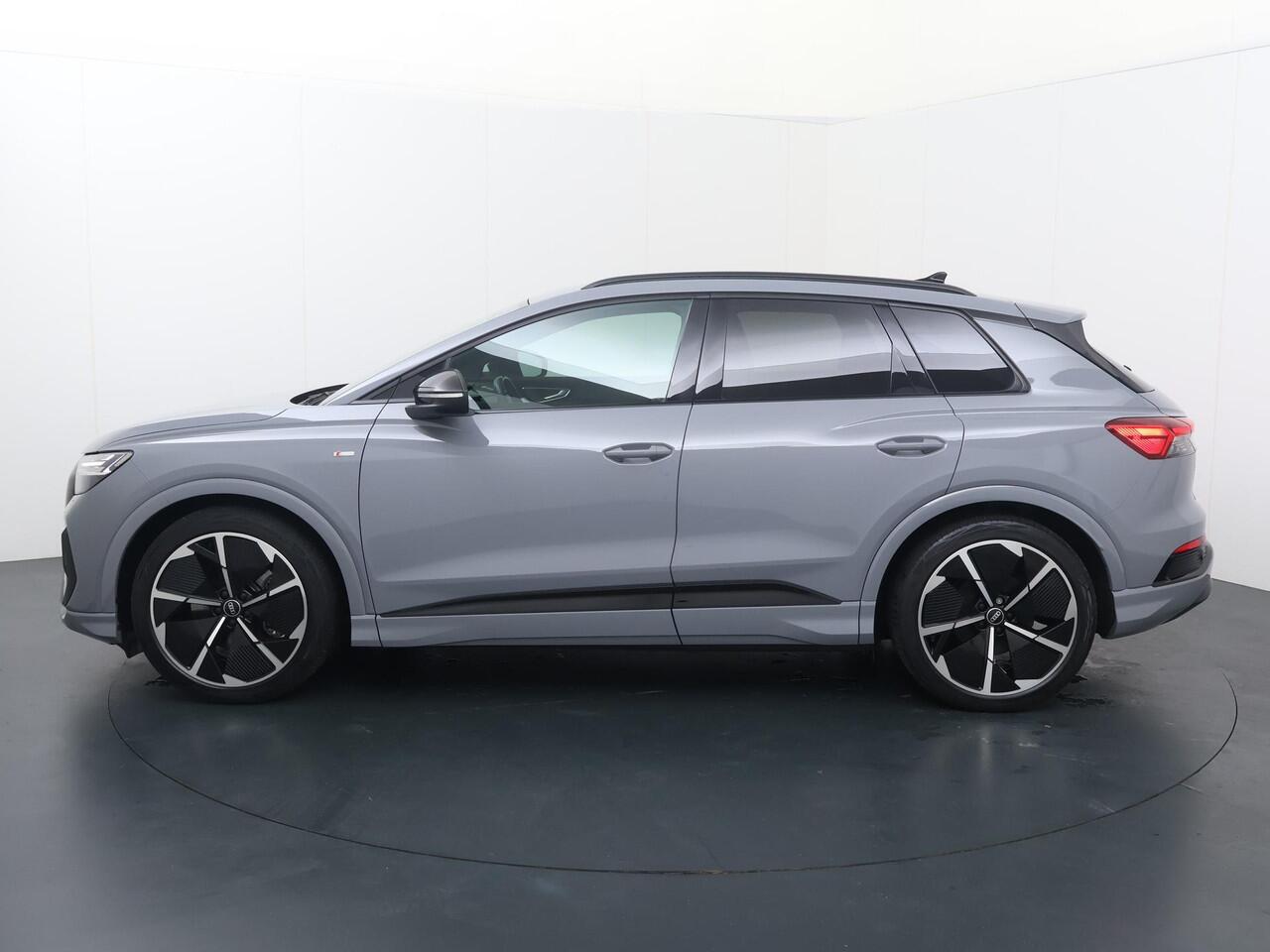 Audi Q4 e-tron 50 quattro Launch edition S Competition 77 kWh | 299 PK | SoH 89% | Warmtepomp | Head-up display | 21" LM velgen | S line | Matrix LED koplampen |