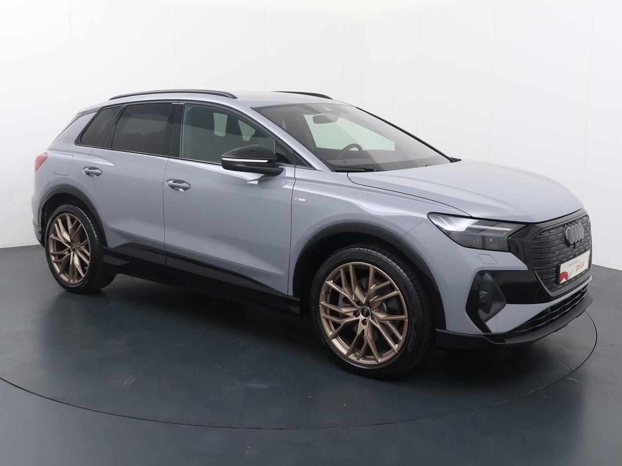 Audi Q4 e-tron 45 quattro S Edition 82 kWh | 286 PK | SoH 99% | Trekhaak | Elek. achterklep | Matrix LED koplampen | 21" LM velgen | Head-up Display |