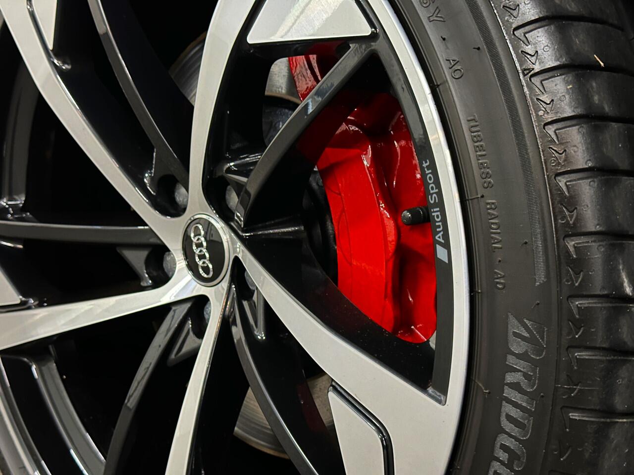 Audi Q7 55 TFSI e S-Line | Panorama | Leder | Luchtvering | LED-Matrix | Keyless-Go | Memory | Stoelverwarming V+A | Camera | Virtual-Cockpit | 3-Zone Clima | Draadloos Laden | Standkachel | Getint Glas |