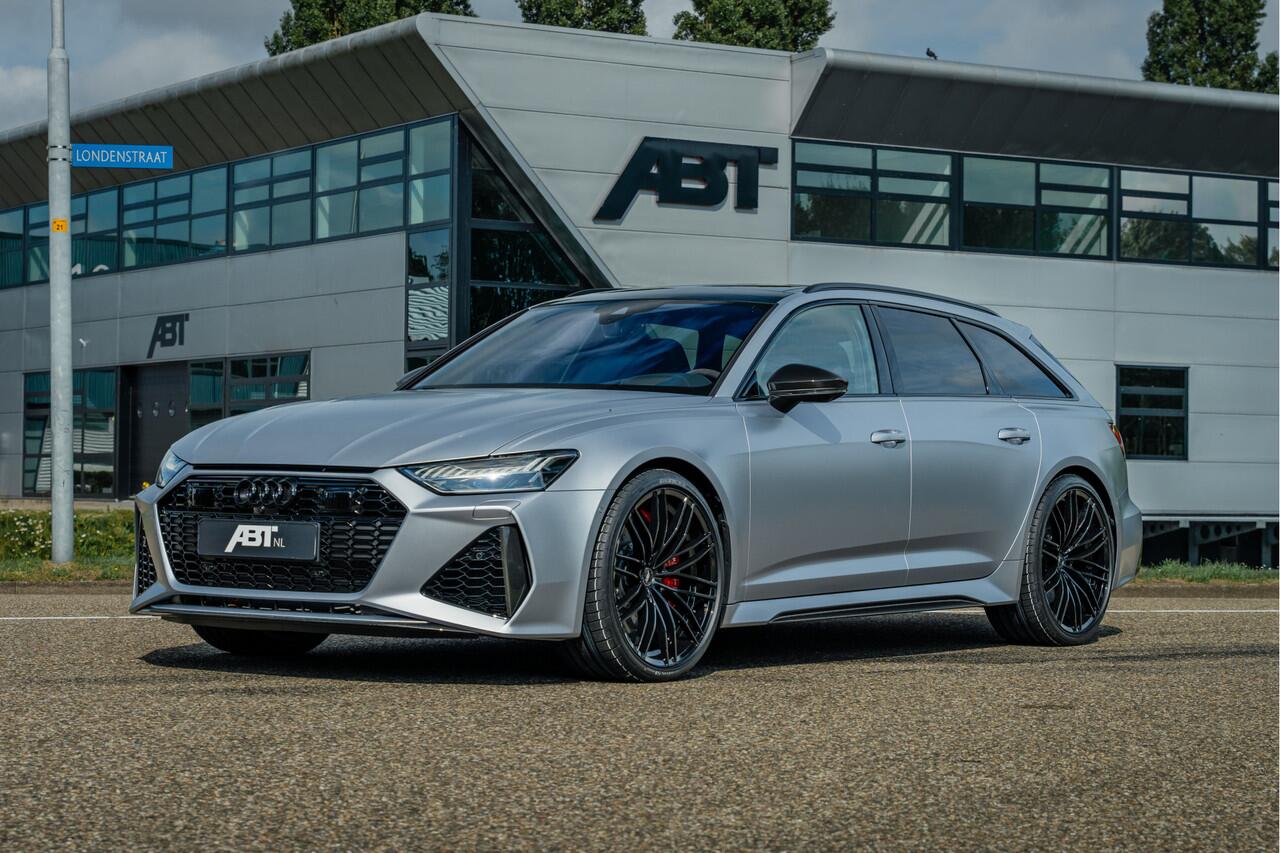 Audi RS6 Avant 4.0 TFSI quattro ABT | ABT HR22 Glossy Black | Audi Exclusive | Carbon optiek | Dynamic plus | Keramische remmen | Design pakket rood | Alcantara hemel | Panorama dak | Assistentiepakket plus | B&O Premium audio | Carbon spiegels | Carnon interieur 