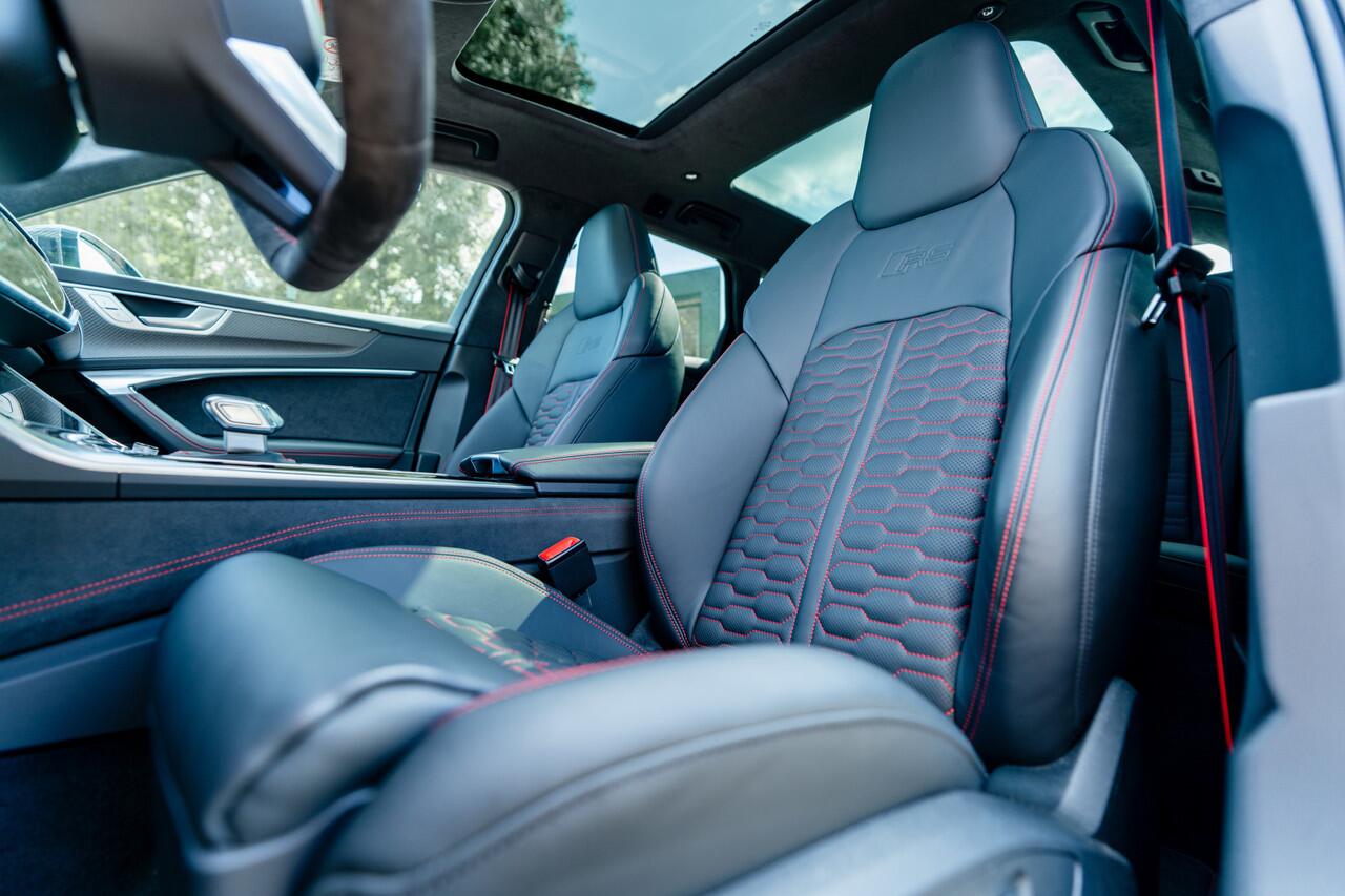 Audi RS6 Avant 4.0 TFSI quattro ABT | ABT HR22 Glossy Black | Audi Exclusive | Carbon optiek | Dynamic plus | Keramische remmen | Design pakket rood | Alcantara hemel | Panorama dak | Assistentiepakket plus | B&O Premium audio | Carbon spiegels | Carnon interieur 