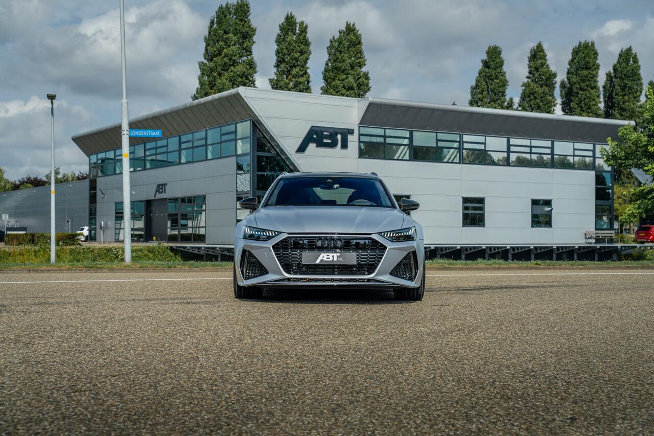Audi RS6 Avant 4.0 TFSI quattro ABT | ABT HR22 Glossy Black | Audi Exclusive | Carbon optiek | Dynamic plus | Keramische remmen | Design pakket rood | Alcantara hemel | Panorama dak | Assistentiepakket plus | B&O Premium audio | Carbon spiegels | Carnon interieur 