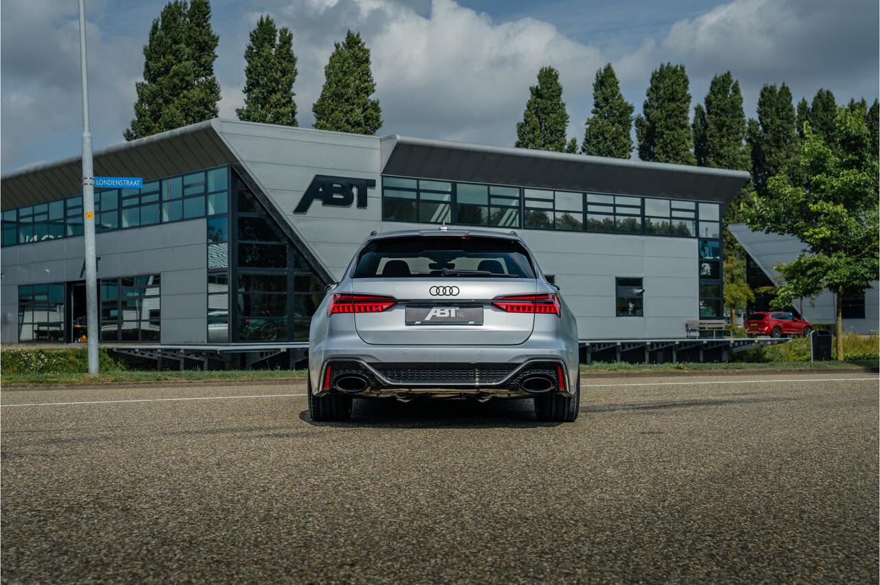 Audi RS6 Avant 4.0 TFSI quattro ABT | ABT HR22 Glossy Black | Audi Exclusive | Carbon optiek | Dynamic plus | Keramische remmen | Design pakket rood | Alcantara hemel | Panorama dak | Assistentiepakket plus | B&O Premium audio | Carbon spiegels | Carnon interieur 