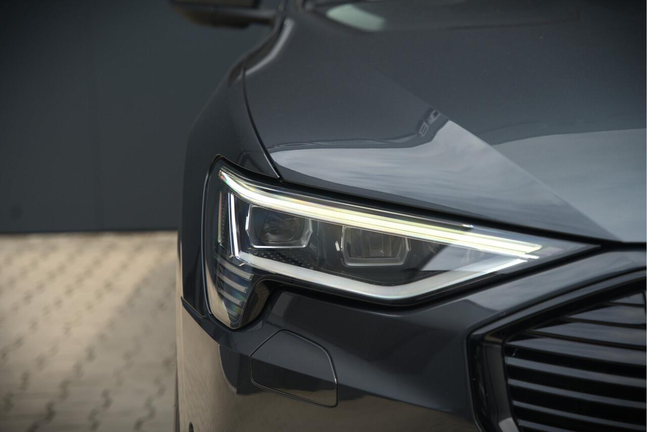 Audi e-tron 50 quattro Business edition Plus 71 kWh | Black Edition | Panoramadak | Camera | Memory Seats | Luchtvering | Adaptive Cruise Control | Keyless | Matrix LED | Leder | Stoelverwarming | NAP |