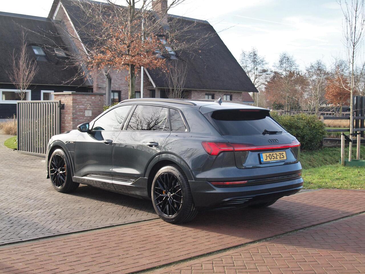 Audi e-tron 55 quattro Business edition 95 kWh | SOH 95% | 21 Inch | Camera | Apple Carplay | Sfeerverlichting | Stoelmemory |