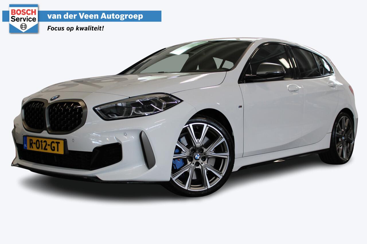 BMW 1-SERIE M135i xDrive High Executive | Akrapovic uitlaatsysteem | Cruise control | Climate control | Stoelverwarming | Apple carplay/Android auto | DAB radio | Dealer onderhouden |