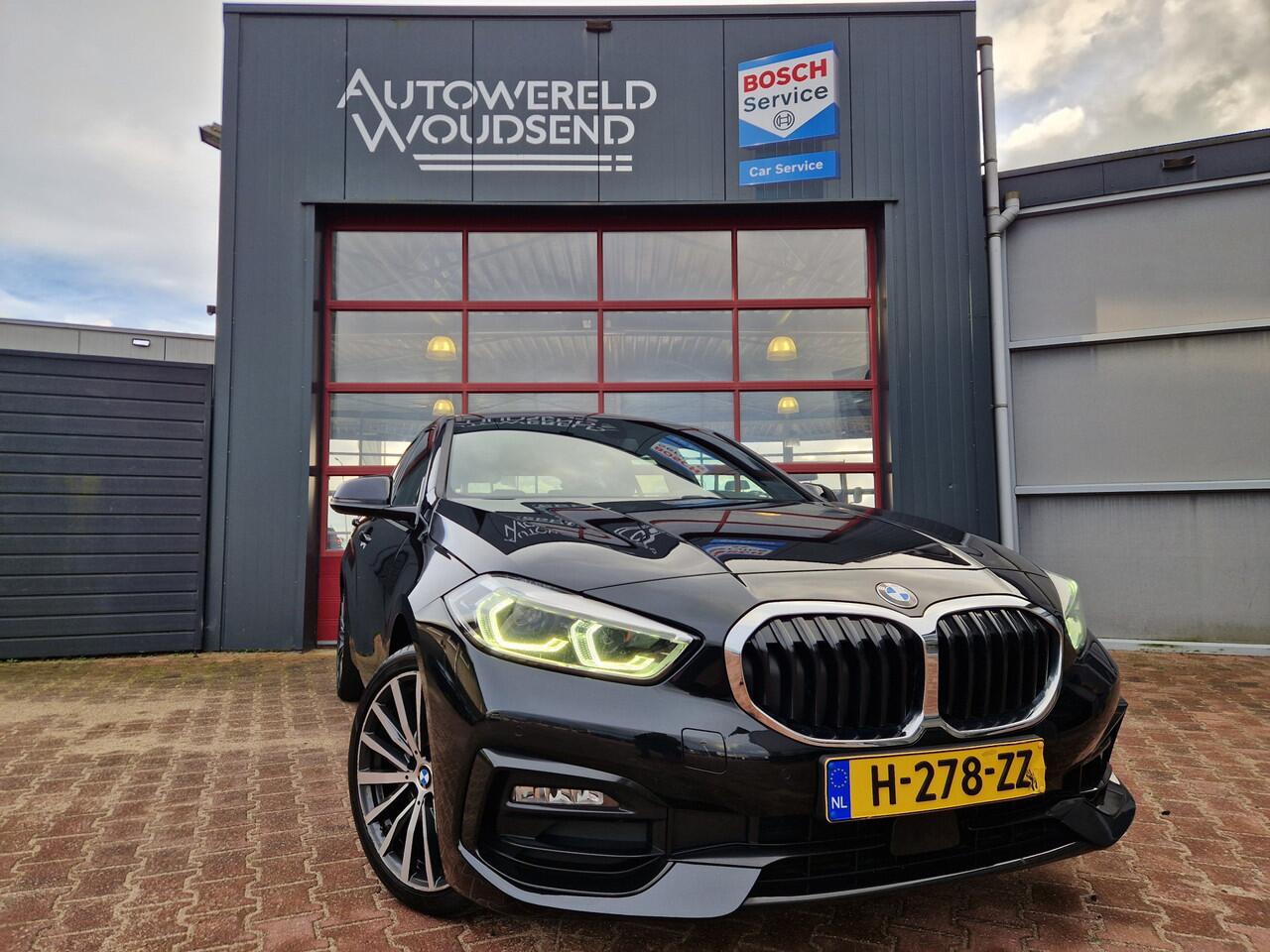 BMW 1-SERIE 118i High Executive Edition 12 MND BOVAG GAR | ECC | PANO | CARPLAY | STOELVERW. | CRUISE | CAMERA | LEER |