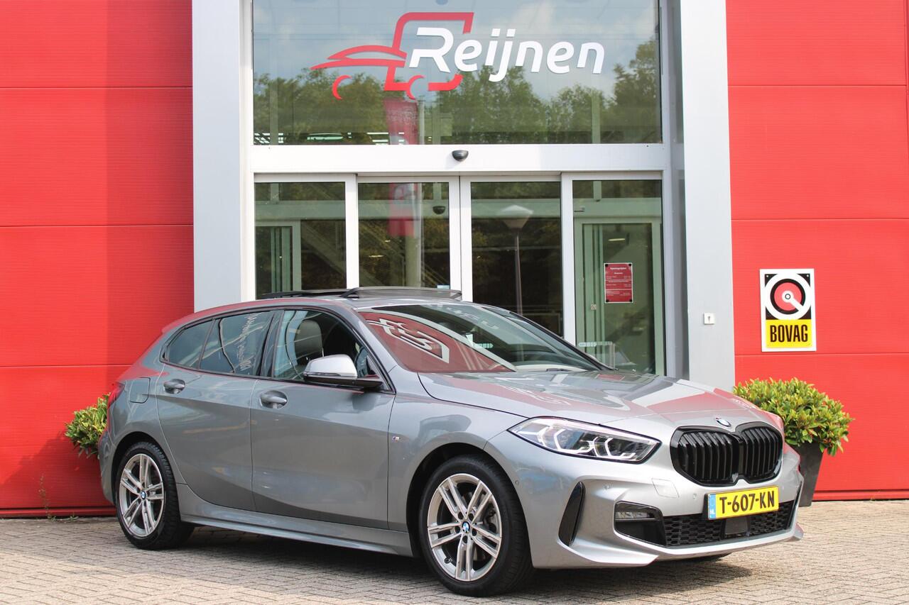 BMW 1-SERIE 118i 136PK INTRODUCTION EDITION M-SPORT | PANORAMISCH SCHUIF/KANTEL DAK | SHADOW LINE PAKKET | SFEER VERLICHTING | LEDEREN BEKLEDING "DAKOTA GEPERFOREERD" | ACHTERUITRIJ CAMERA | PARKEERSENSOREN VOOR EN ACHTER | ALARM | STOEL VERWARMING | DRAADLOZE APPLE 