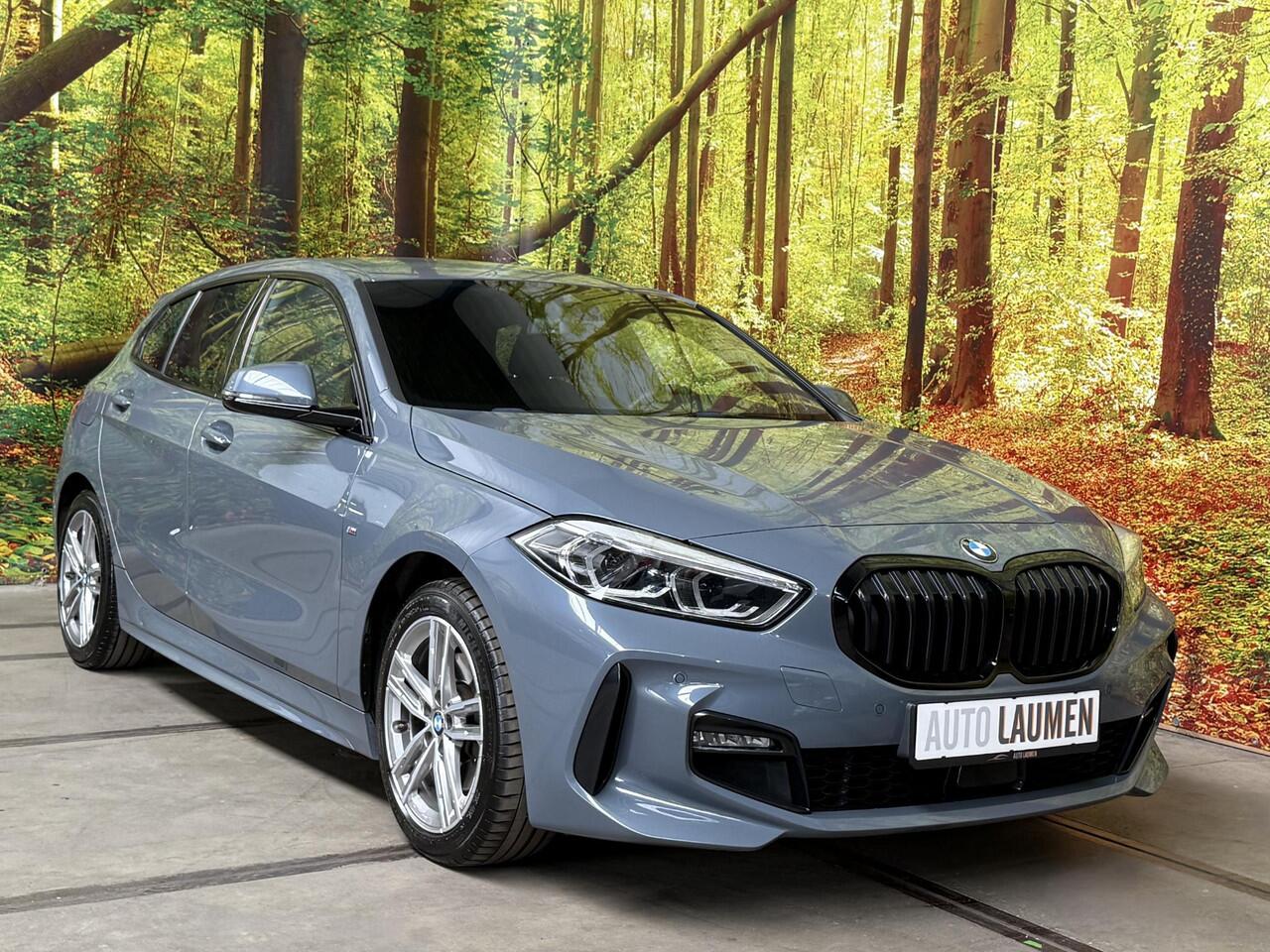 BMW 1-SERIE 116i High Executive M-Sport 5-Deurs Stormbay Met. Shadowline Navi DAB LED PDC V+A Virtual Stoelverw.