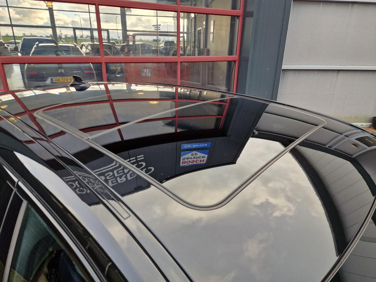 BMW 1-SERIE 118i High Executive Edition 12 MND BOVAG GAR | ECC | PANO | CARPLAY | STOELVERW. | CRUISE | CAMERA | LEER |