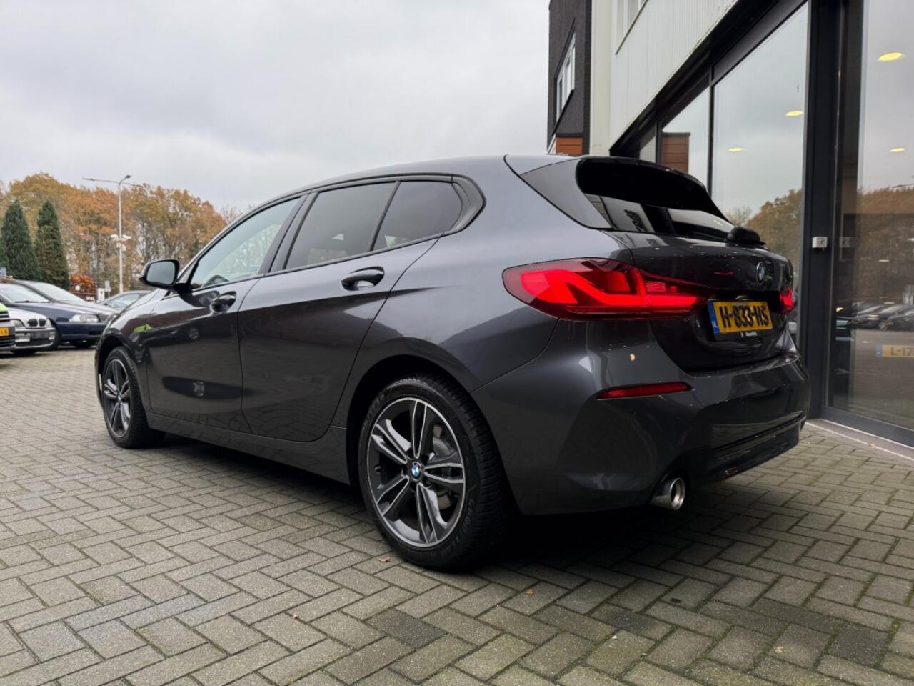 BMW 1-SERIE 118I Sportline,LED,Clima,Navi/Carplay,Digi Display,Dealer OH,