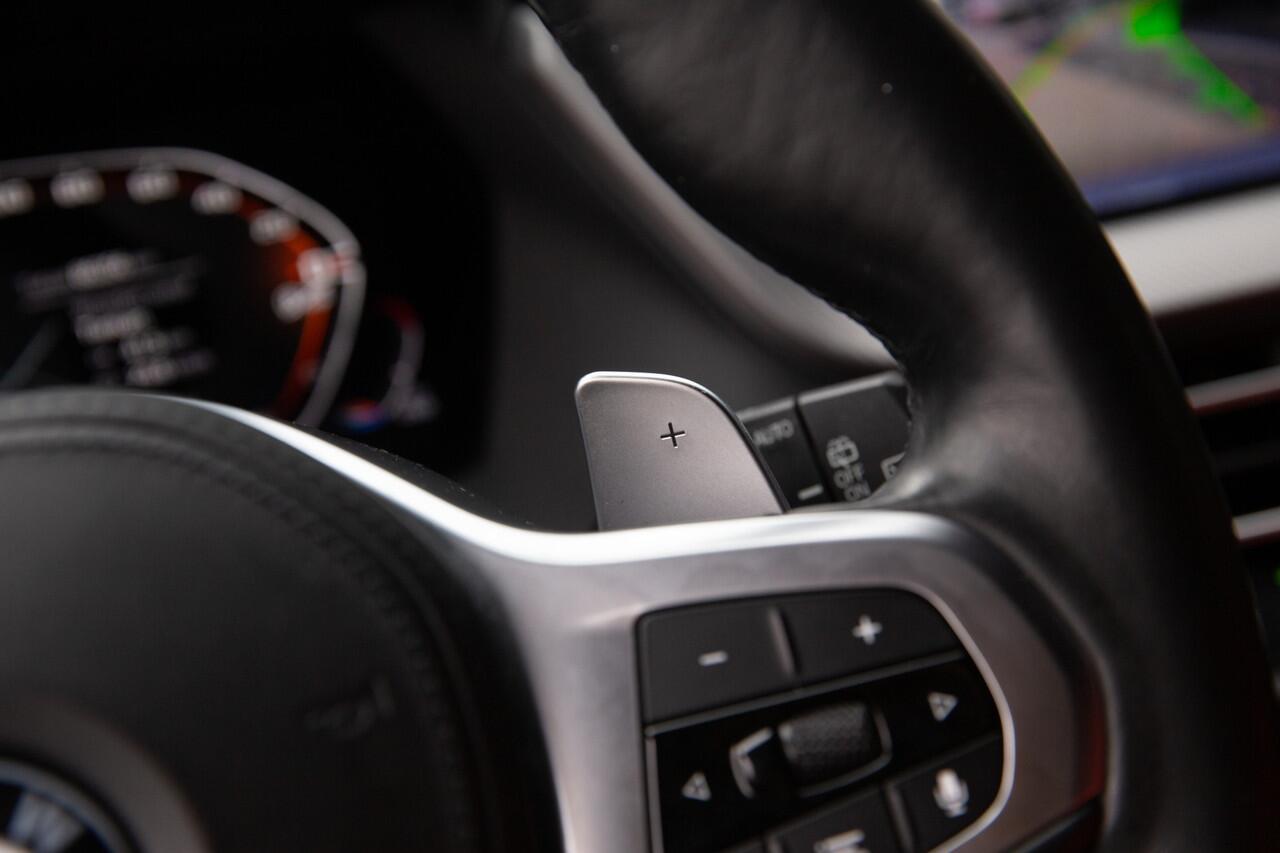 BMW 1-SERIE M135i xDrive High Executive 306pk , Kuipstoelen, Harman/Kardon, Head-up display, Sfeerverlichting