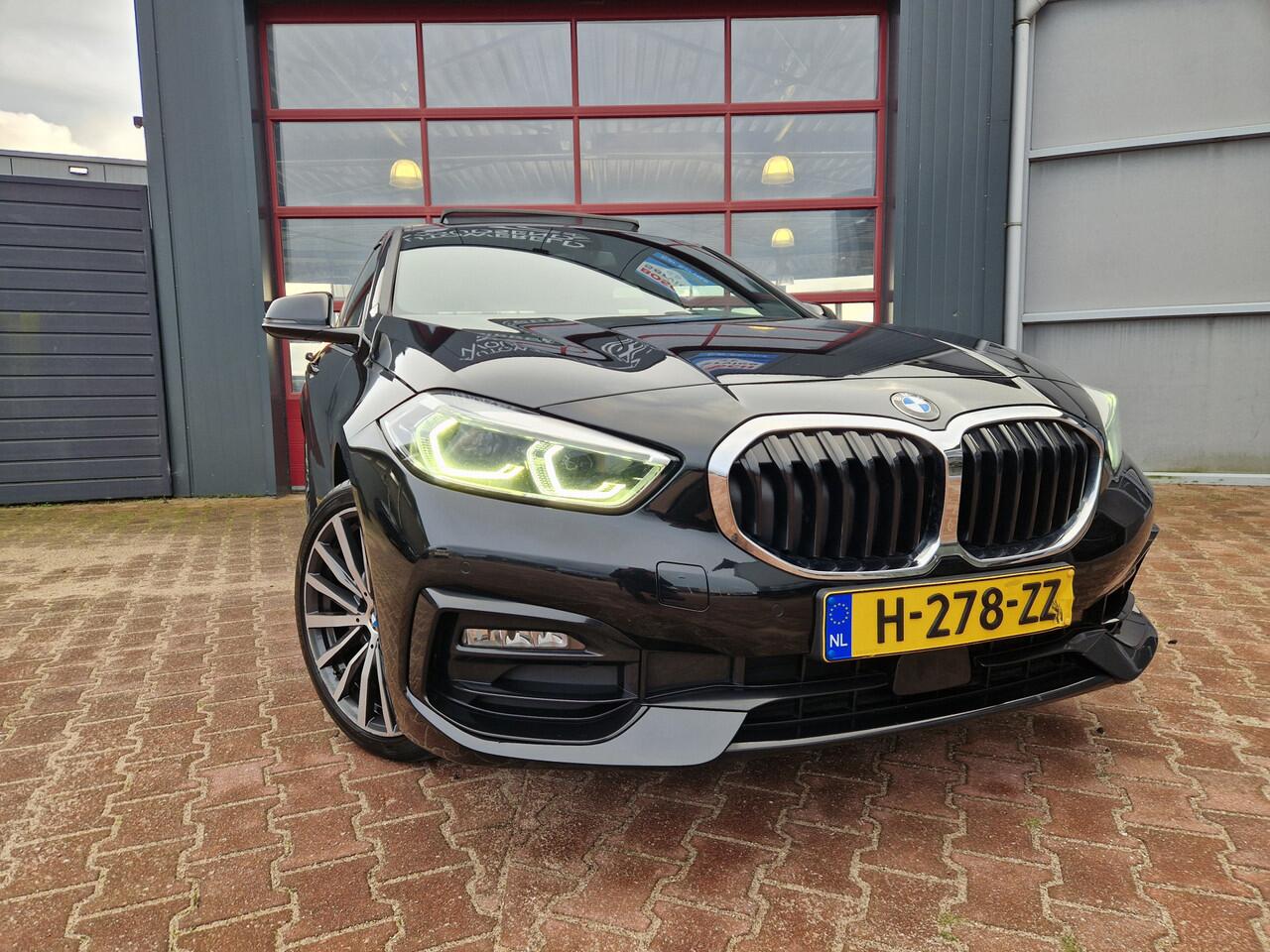 BMW 1-SERIE 118i High Executive Edition 12 MND BOVAG GAR | ECC | PANO | CARPLAY | STOELVERW. | CRUISE | CAMERA | LEER |