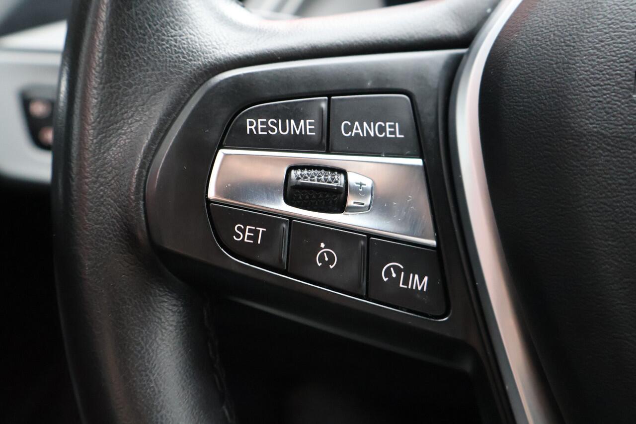 BMW 1-SERIE 118i Executive | Origineel NL | Virtual Cockpit | Cruise Control | Navigatie |