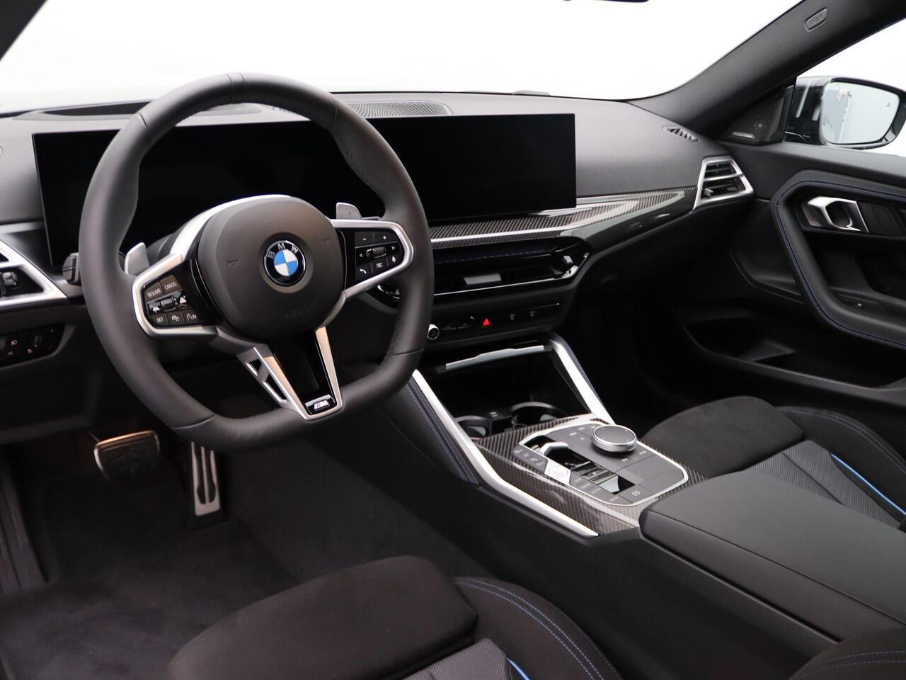 BMW 2-SERIE Coupé 220i High Executive | M Sportpakket Pro | Innovation Pack | Premium Pack | Stuurwielrand Verwarmd | Comfort Access | Schuifdak | Elektrisch Verstelbare Sportstoelen | Active Cruise Control | Harman Kardon | 19''
