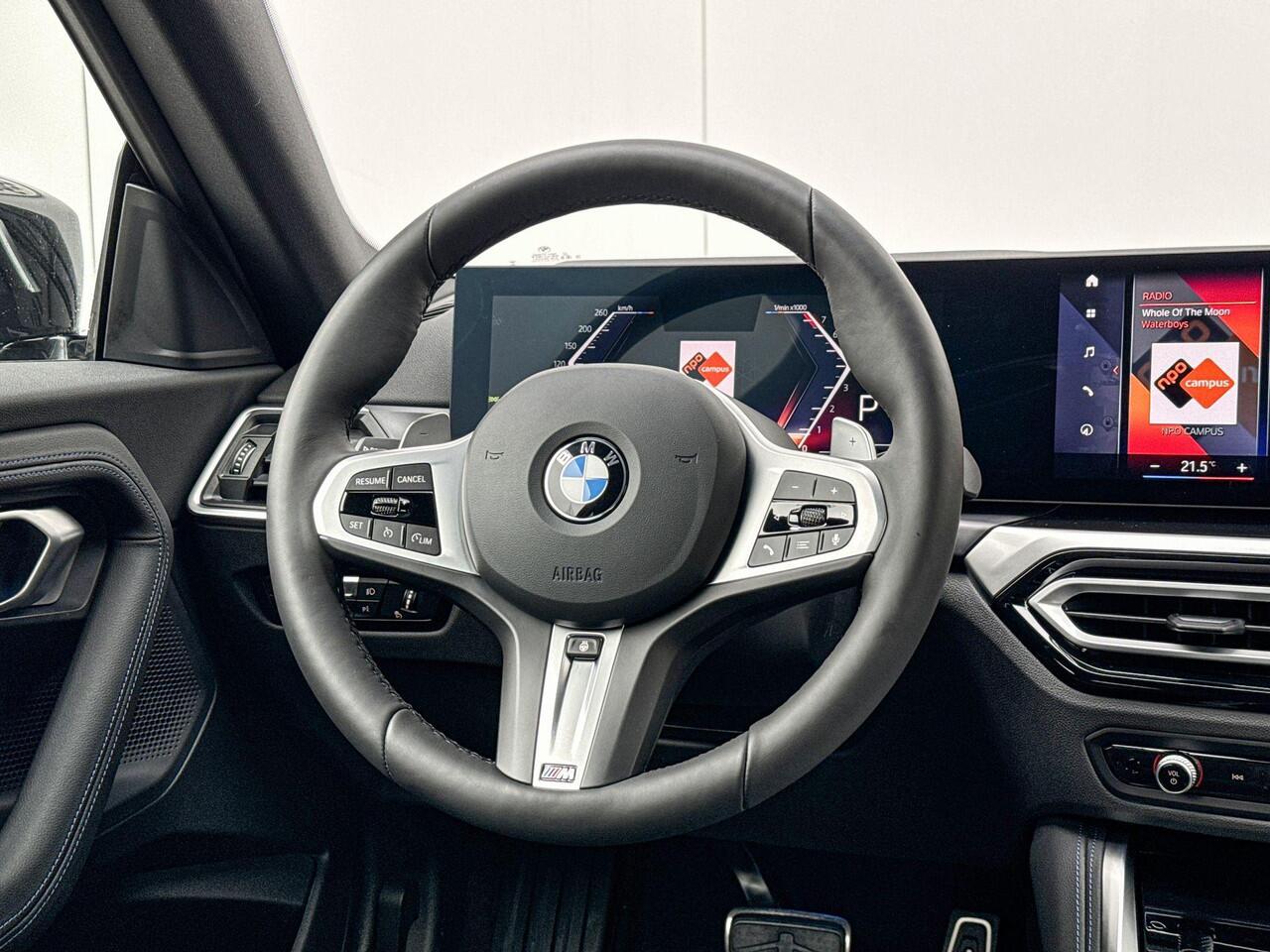 BMW 2-SERIE Coupé 218i | M Sport | Parking Assistant | Getinte Ruiten