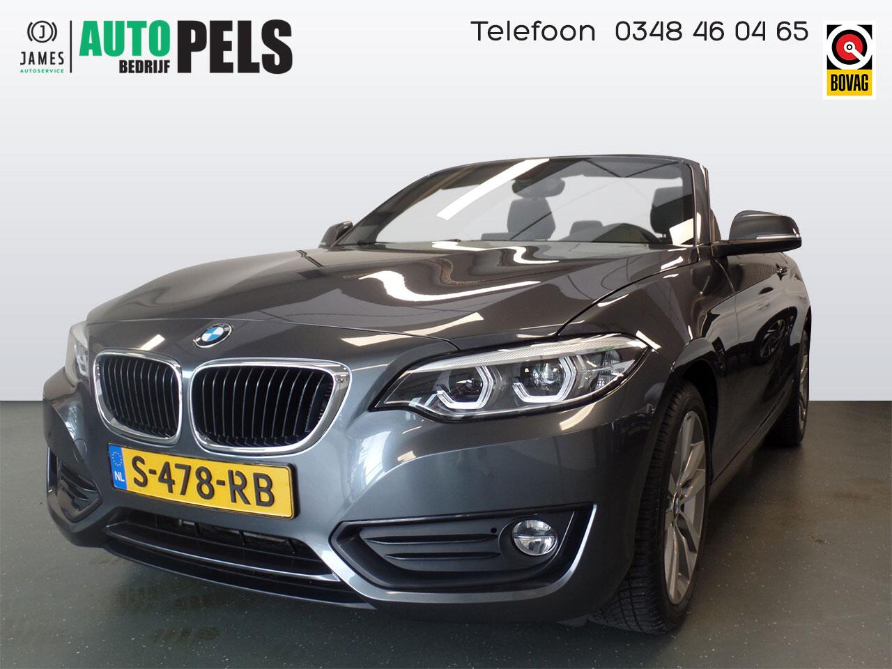 BMW 2-SERIE Cabrio 218i High Executive Xenon, Leder, Stoelverwarming, Cruise controle, Elek kap, Lm velgen 17", Navigatie, Pdc, Full options, 62.000km Uniek!! Bovag afleverpakket 695,-