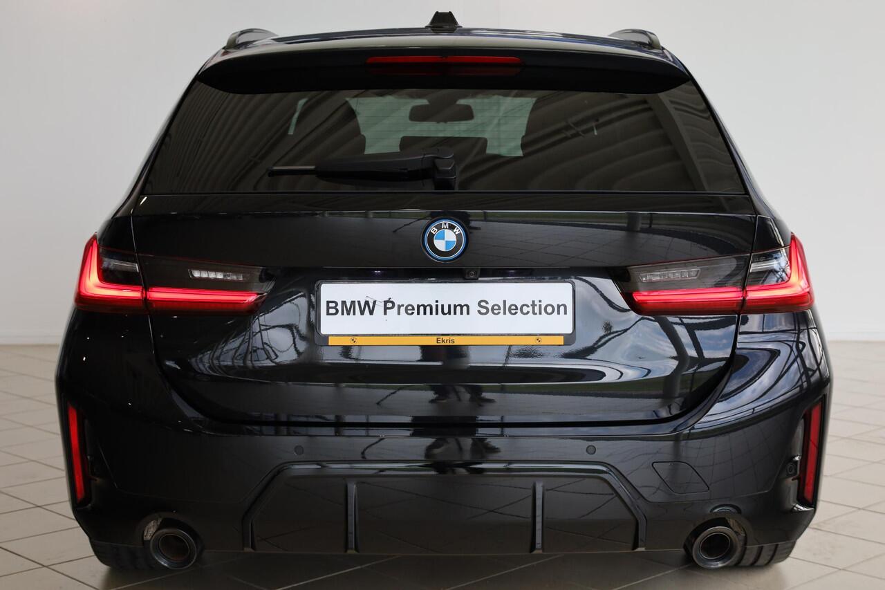 BMW 3-SERIE Touring 320e | Elektrisch Glazen Panorama-dak | M Sportpakket | cruise control adaptief met Stop&Go | Travel Pack
