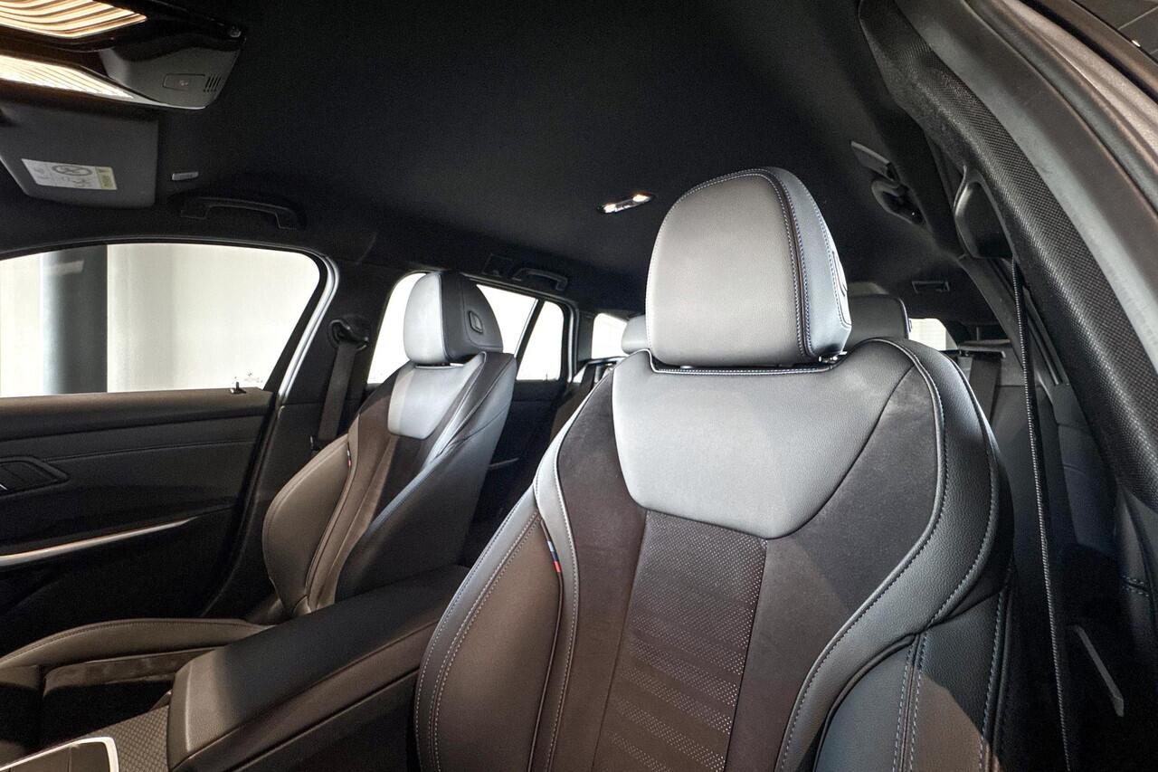 BMW 3-SERIE Touring 318i | M Sport | Stoelverwarming | Achteruitrijcamera | Trekhaak |