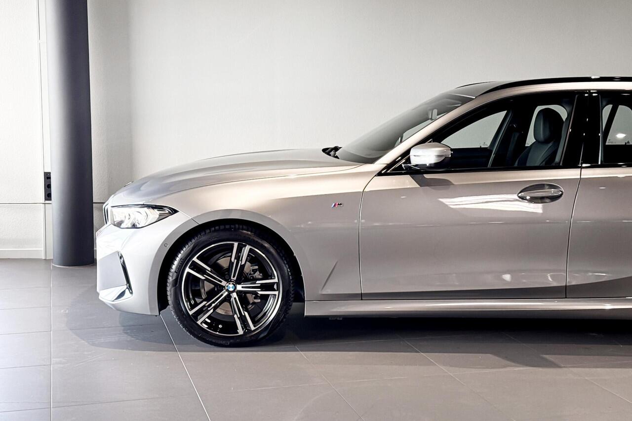 BMW 3-SERIE Touring 318i | M Sport | Stoelverwarming | Achteruitrijcamera | Trekhaak |