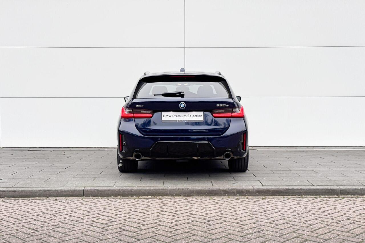 BMW 3-SERIE Touring 330e xDrive M-Sport PRO | Panoramadak | Trekhaak | Driving Assistant Professional