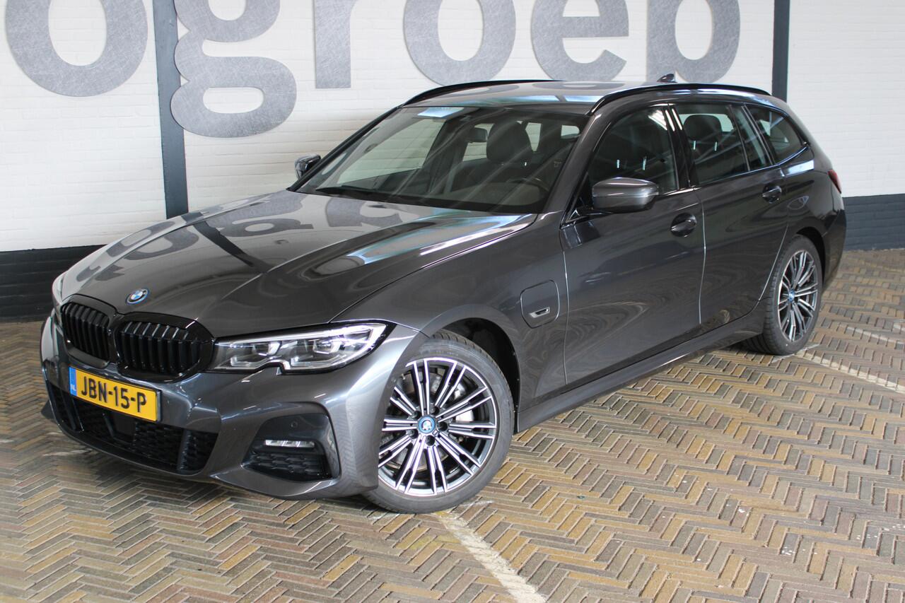 BMW 3-SERIE Touring 330e Business Edition Plus Adaptieve cruise control | Climate control | Stoel/stuur verwarming | Zomer + winterset | Elektrisch uitklapbare trekhaak | Parkeercamera |