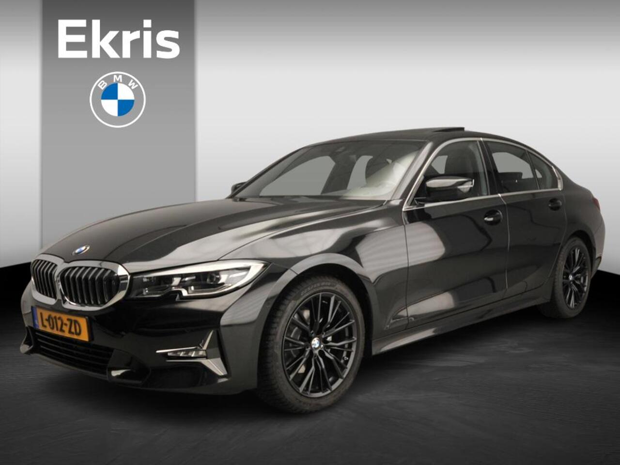 BMW 3-SERIE Sedan 320i | LED | Navigatie | Schuifdak | Sportstoelen | Clima | PDC | DAB | Alu 18 inch