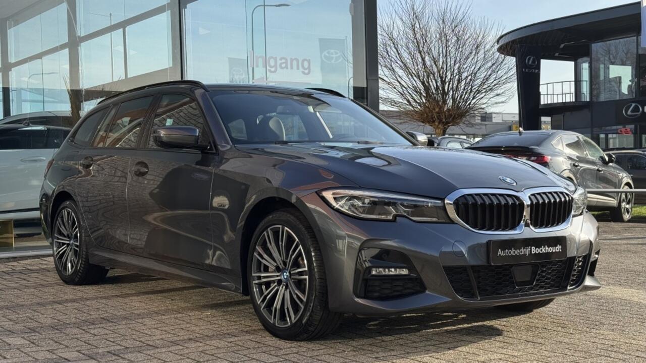BMW 3-SERIE Touring 330e xDr. High Exec. | M-Sport | HUD | Leer | Navi