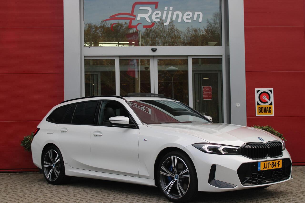 BMW 3-SERIE Touring 330e 292PK M-SPORT | PANORAMISCH SCHUIF/KANTEL DAK | M-SPORT PRO-PAKKET | M-SPORT REMMEN UITGEVOERD IN DONKERBLAUW MET M LOGO | BMW LIVE COCKPIT PROFESSIONAL | CURVED DISPLAY |DRIVING ASSISTANT INCL. HEAD-UP DISPLAY | PARKING ASSIST INCL. ACHTERUI