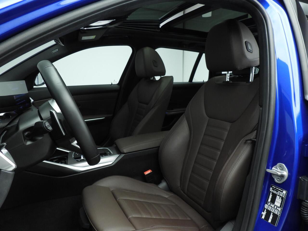 BMW 3-SERIE Touring 318i | M-Sportpakket | LED | Leder | Navigatie | Schuifdak | Trekhaak | Stoelverwarming | DAB | Alu 19 inch