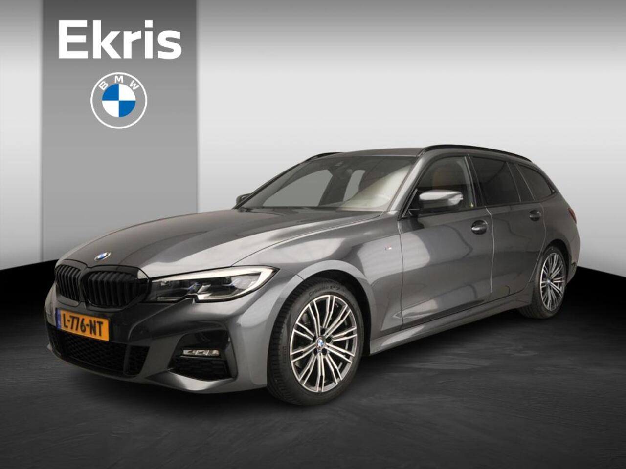BMW 3-SERIE Touring 318i | M-Sportpakket | Laserlicht | Leder | Navigatie | Sportstoelen | Stoelverwarming | DAB | Alu 18 inch