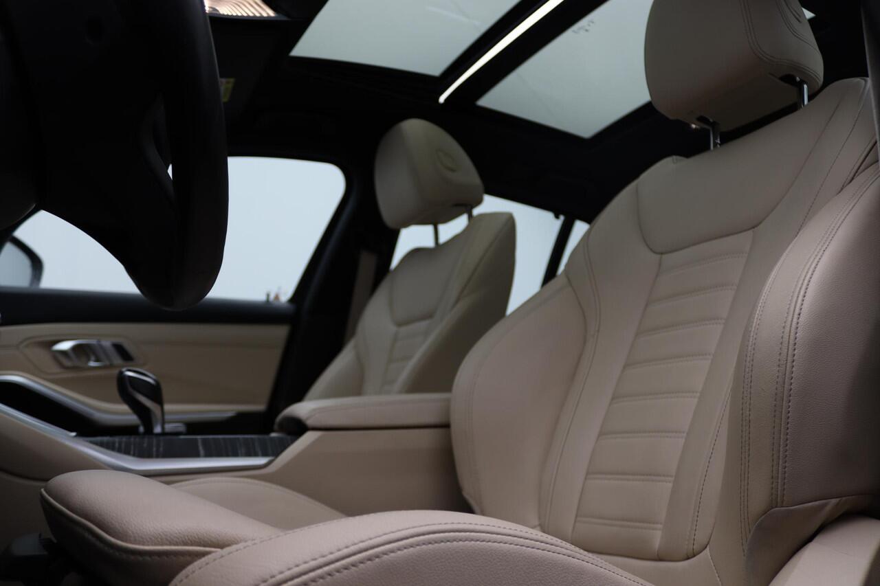 BMW 3-SERIE Touring 320e High Executive | Luxury Line | Audio Media Pack | Parking Pack | Safety Pack | BMW Personal CoPilot Pack | Stuurwielrand Verwarmd | Trekhaak | Panoramadak | Driving Assistant Professional | Head-Up Display | DAB | HiFi | 18''