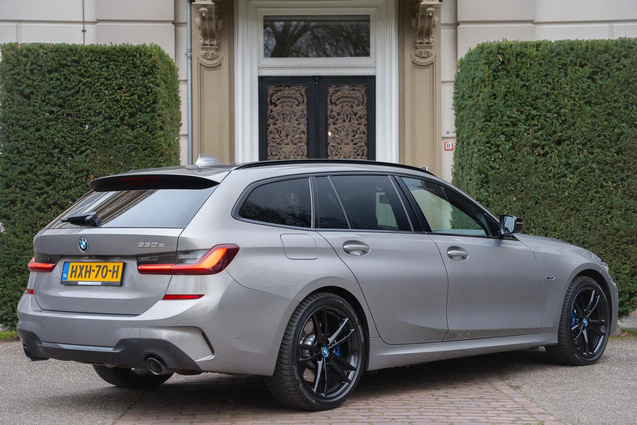 BMW 3-SERIE Touring 330e High Executive TREKHAAK | PANO | KUIPSTOELEN | LASER | ACC | H&K