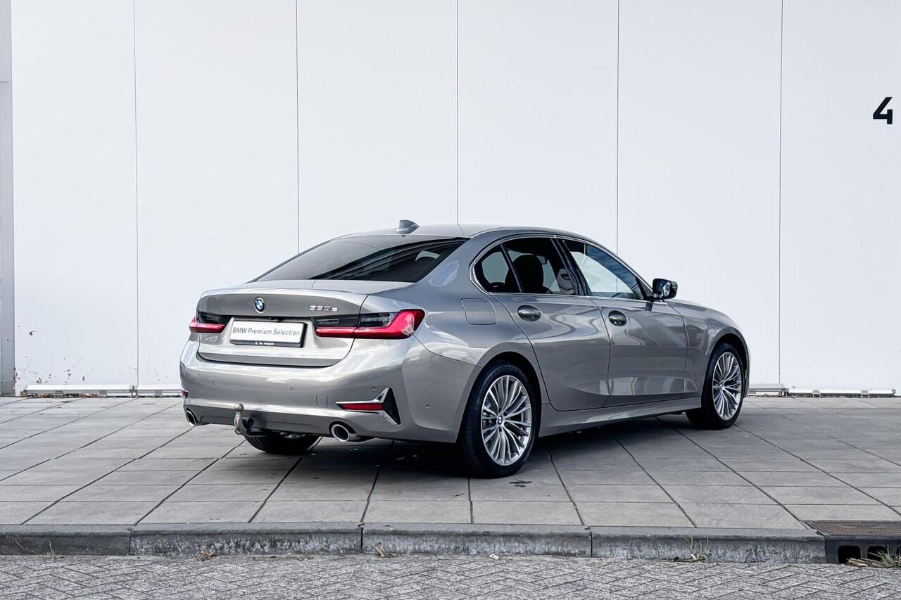 BMW 3-SERIE Sedan 330e High Executive / Harman Kardon / Head Up / Adaptive Cruise Control / Comfort Access / 18 Inch / Trekhaak Zwenkbaar / Selections